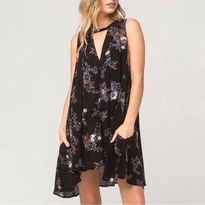Free People Black floral dress. Size LARGE